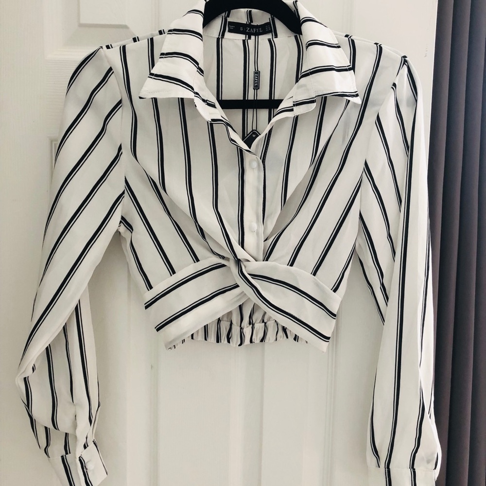 Cropped button up blouse.